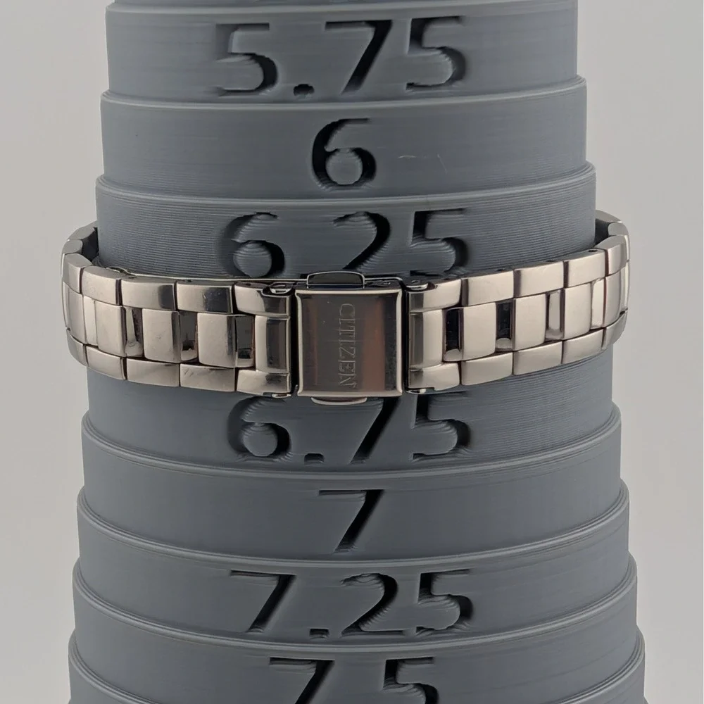 Citizen Eco-Drive E001-K17560 Gray Sunburst Dial Day/Date WR100 Women's Watch